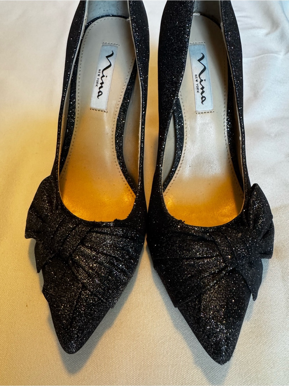Nina Black Glitter Pointed Toe Pumps with Bow Accent